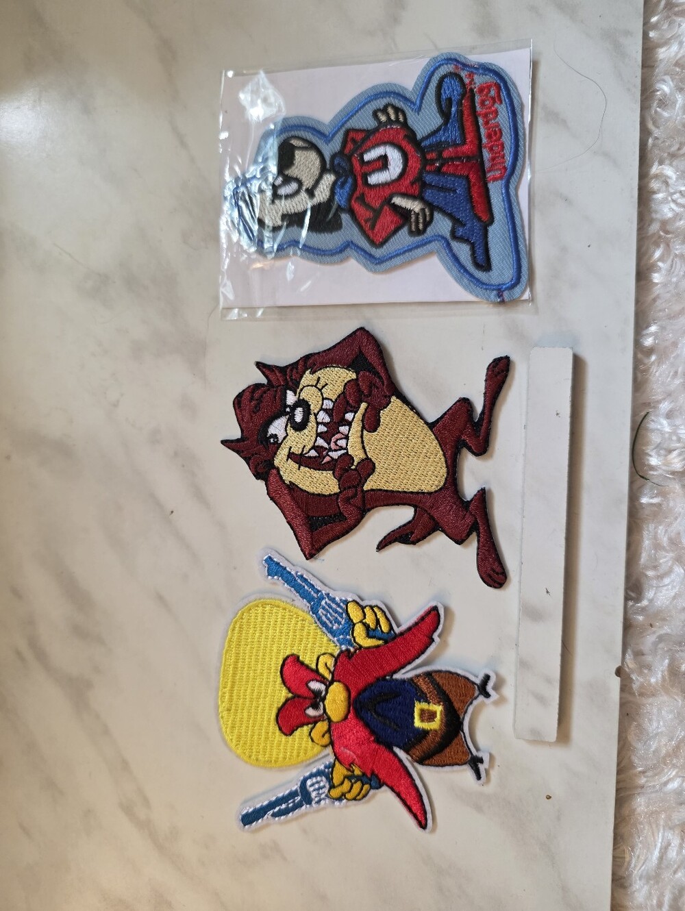 Warner Bros. Looney Tunes Patch Set - Red, Yellow, Blue, Brown